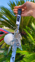 All white 'NIKE' safety lanyard